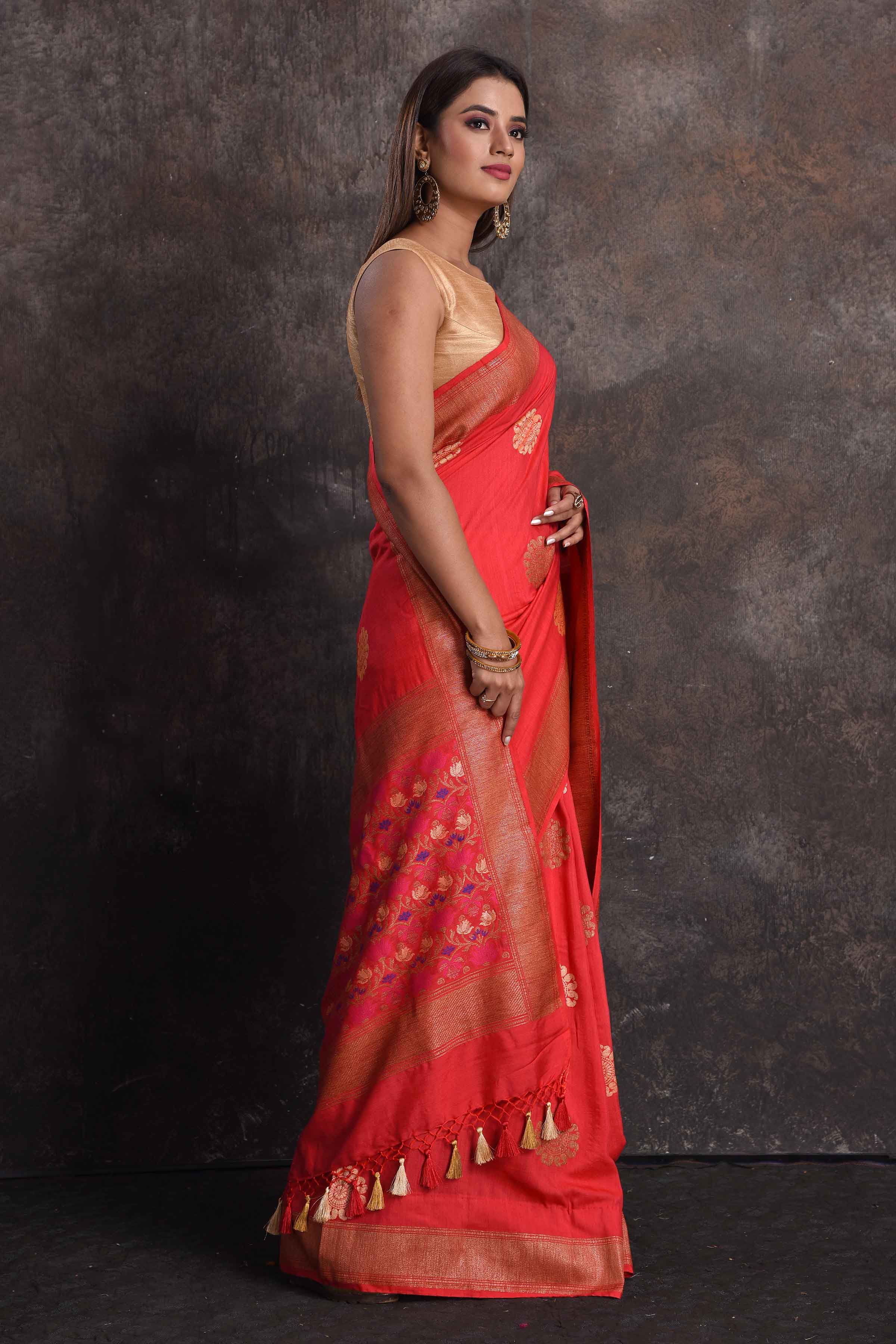 Shop beautiful red Muga silk saree online in USA with golden zari flower buta, Be a vision of ethnic elegance on festive occasions in beautiful designer sarees, silk sarees, handloom sarees, Kanchipuram silk sarees, embroidered sarees from Pure Elegance Indian saree store in USA. -side
