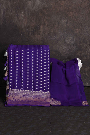 Shop stunning purple georgette Banarasi saree online in USA with silver zari border, Be a vision of ethnic elegance on festive occasions in beautiful designer sarees, silk sarees, handloom sarees, Kanchipuram silk sarees, embroidered sarees from Pure Elegance Indian saree store in USA. -blouse