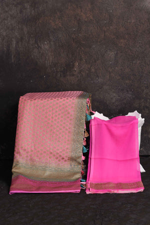 Shop light pink georgette Banarasi saree online in USA with blue border, Be a vision of ethnic elegance on festive occasions in beautiful designer sarees, silk sarees, handloom sarees, Kanchipuram silk sarees, embroidered sarees from Pure Elegance Indian saree store in USA. -blouse
