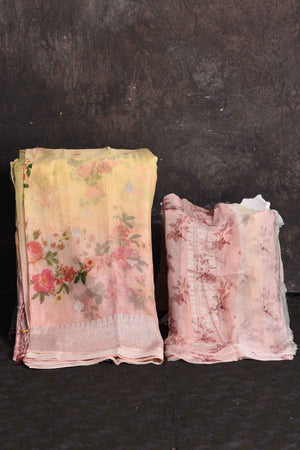 Shop beautiful powder pink yellow floral georgette saree online in USA with zari border, Be a vision of ethnic elegance on festive occasions in beautiful designer sarees, silk sarees, handloom sarees, Kanchipuram silk sarees, embroidered sarees from Pure Elegance Indian saree store in USA. -blouse