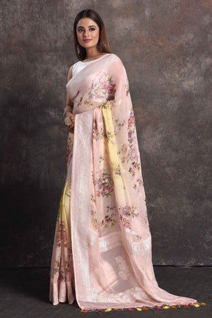 Shop beautiful powder pink yellow floral georgette saree online in USA with zari border, Be a vision of ethnic elegance on festive occasions in beautiful designer sarees, silk sarees, handloom sarees, Kanchipuram silk sarees, embroidered sarees from Pure Elegance Indian saree store in USA. -pallu