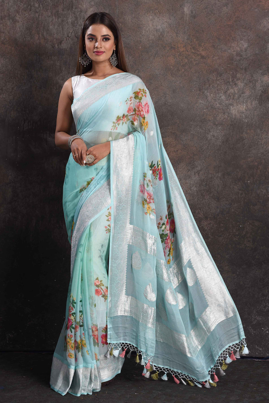 Shop beautiful mint green floral georgette saree online in USA with zari border, Be a vision of ethnic elegance on festive occasions in beautiful designer sarees, silk sarees, handloom sarees, Kanchipuram silk sarees, embroidered sarees from Pure Elegance Indian saree store in USA. -full view