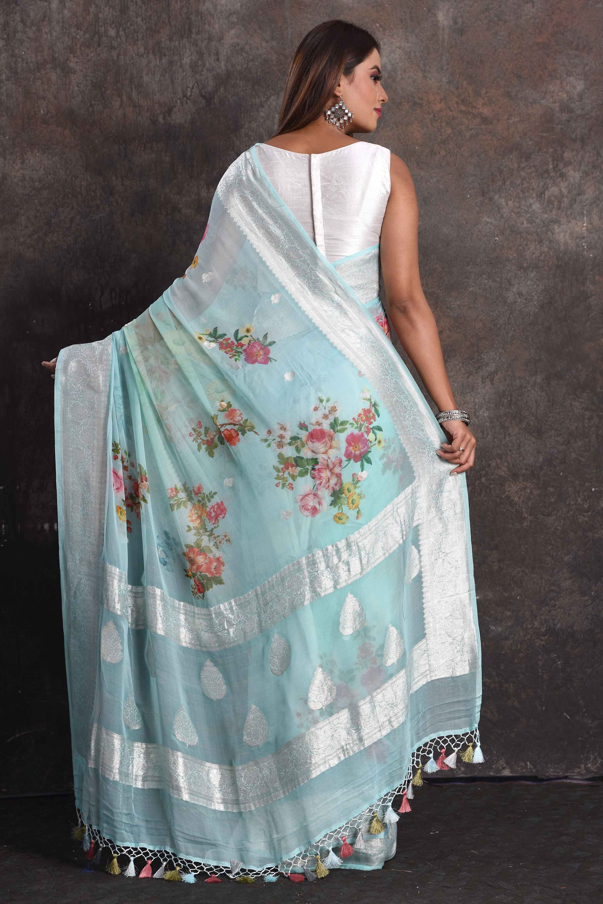 Shop beautiful mint green floral georgette saree online in USA with zari border, Be a vision of ethnic elegance on festive occasions in beautiful designer sarees, silk sarees, handloom sarees, Kanchipuram silk sarees, embroidered sarees from Pure Elegance Indian saree store in USA.  -back