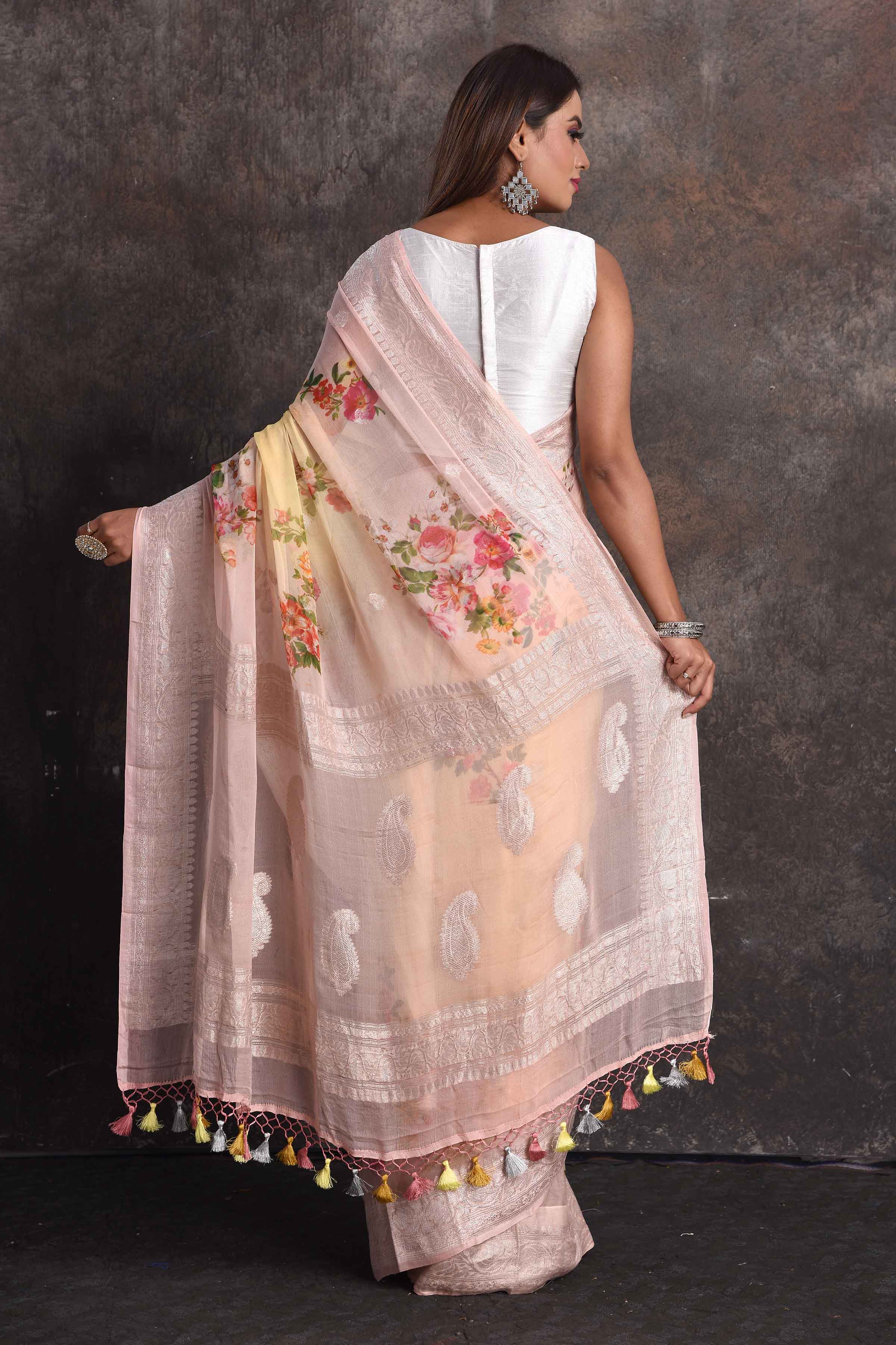 Buy beautiful yellow peach floral georgette saree online in USA with zari border, Be a vision of ethnic elegance on festive occasions in beautiful designer sarees, silk sarees, handloom sarees, Kanchipuram silk sarees, embroidered sarees from Pure Elegance Indian saree store in USA. -back