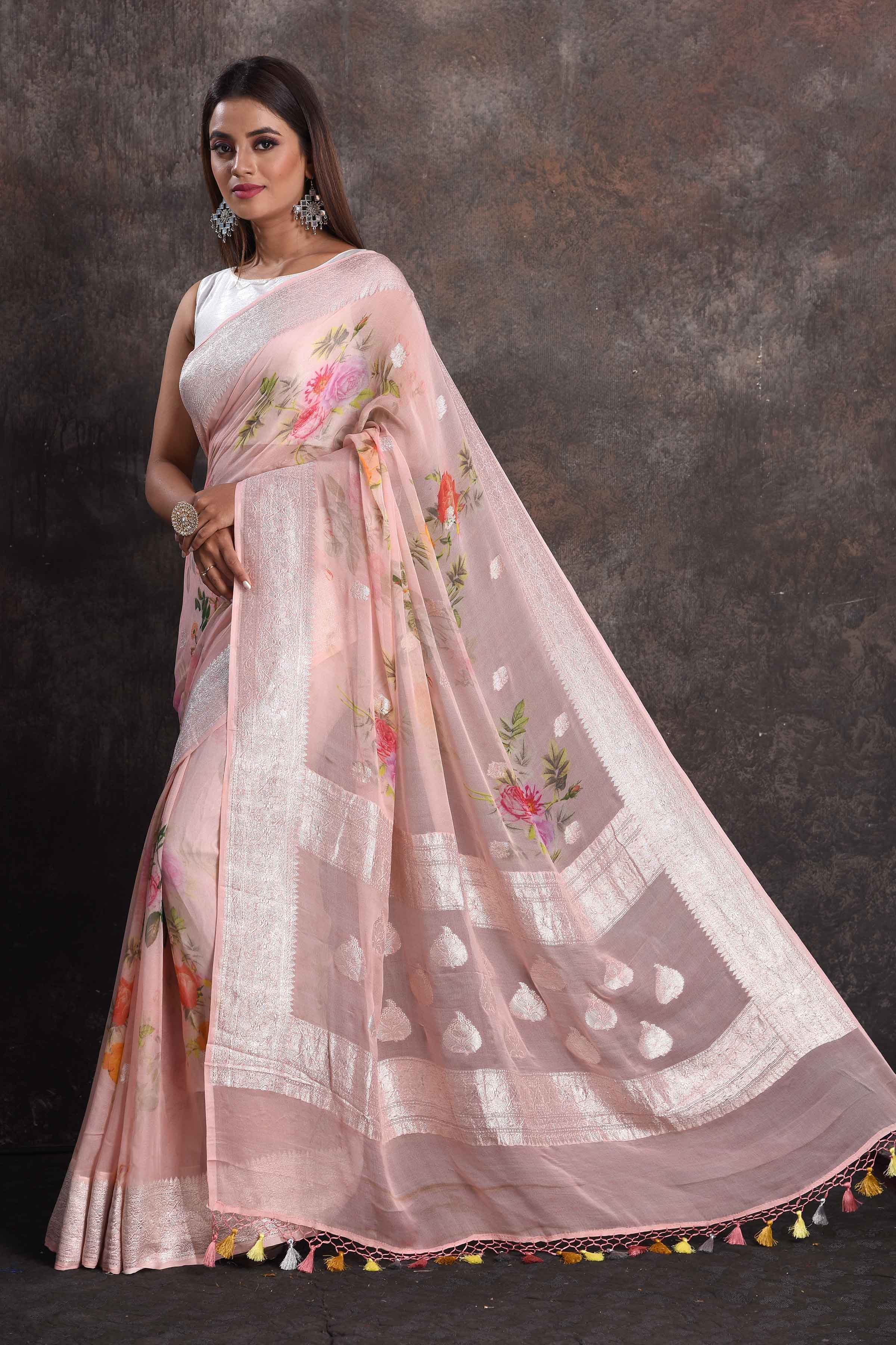 Shop beautiful powder pink floral print georgette saree online in USA with zari border, Be a vision of ethnic elegance on festive occasions in beautiful designer sarees, silk sarees, handloom sarees, Kanchipuram silk sarees, embroidered sarees from Pure Elegance Indian saree store in USA. -pallu