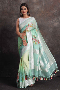 Buy beautiful ombre pastel green floral georgette saree online in USA with zari border, Be a vision of ethnic elegance on festive occasions in beautiful designer sarees, silk sarees, handloom sarees, Kanchipuram silk sarees, embroidered sarees from Pure Elegance Indian saree store in USA. -full view
