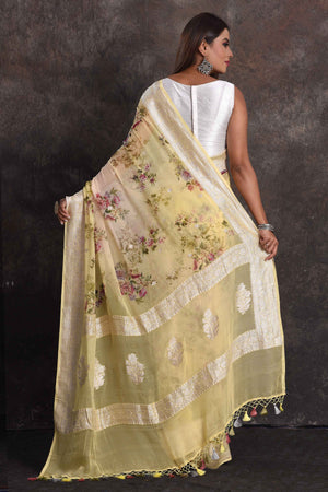 Shop beautiful ombre yellow floral georgette saree online in USA with zari border, Be a vision of ethnic elegance on festive occasions in beautiful designer sarees, silk sarees, handloom sarees, Kanchipuram silk sarees, embroidered sarees from Pure Elegance Indian saree store in USA. -back