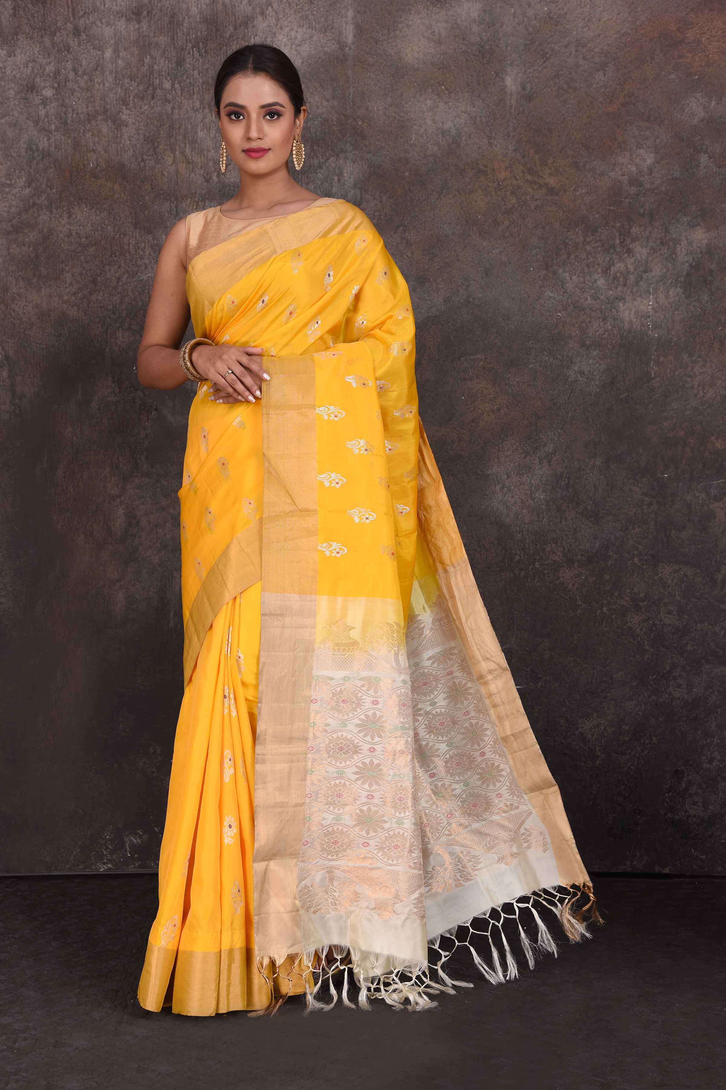 Shop beautiful yellow Kanjeevaram silk sari online in USA with zari minakari buta. Look your best at parties in elegant silk sarees, designer sarees, handwoven sarees, Kanchipuram silk sarees, embroidered sarees, South silk sarees from Pure Elegance Indian saree store in USA.-full view