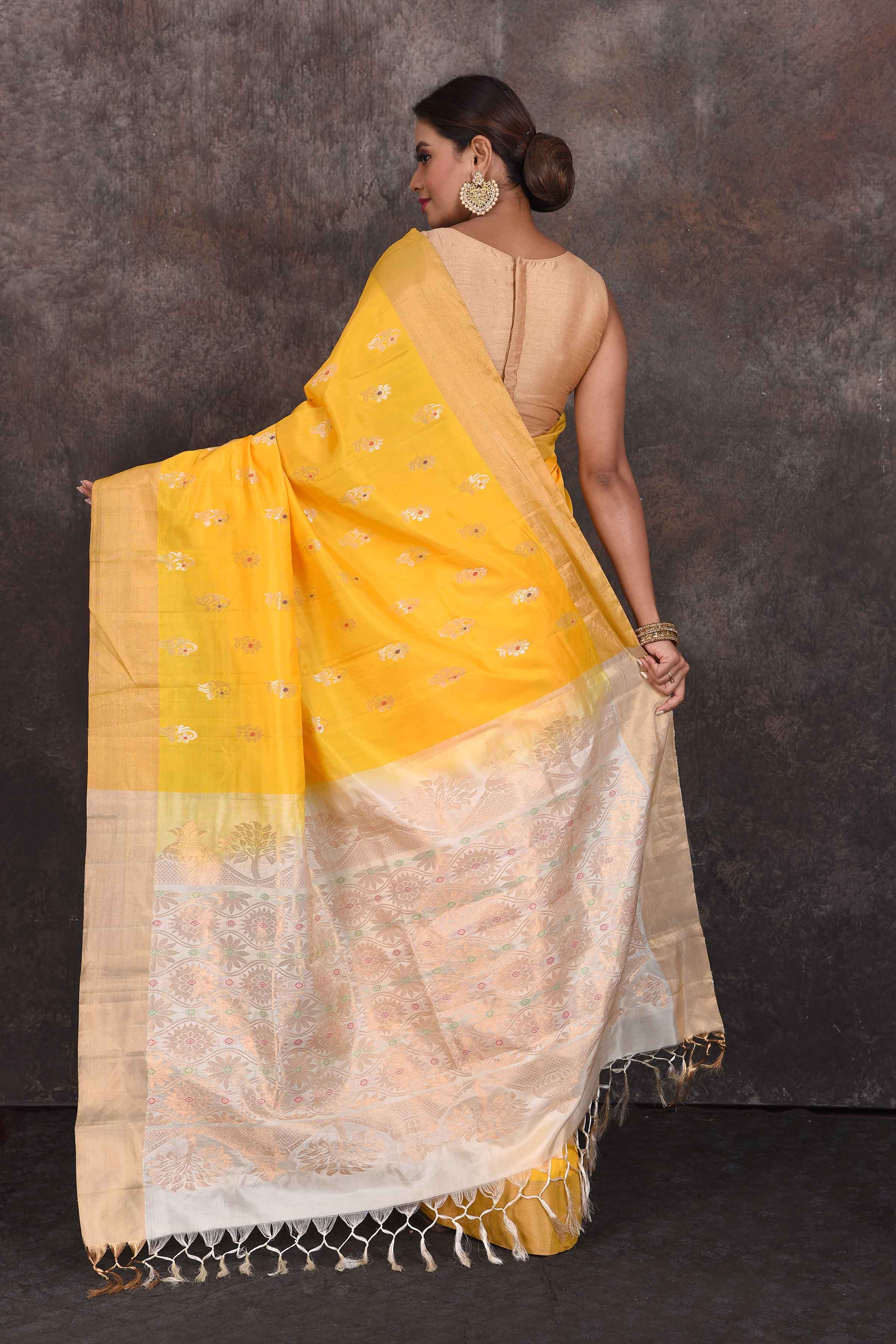 Shop beautiful yellow Kanjeevaram silk sari online in USA with zari minakari buta. Look your best at parties in elegant silk sarees, designer sarees, handwoven sarees, Kanchipuram silk sarees, embroidered sarees, South silk sarees from Pure Elegance Indian saree store in USA.- back