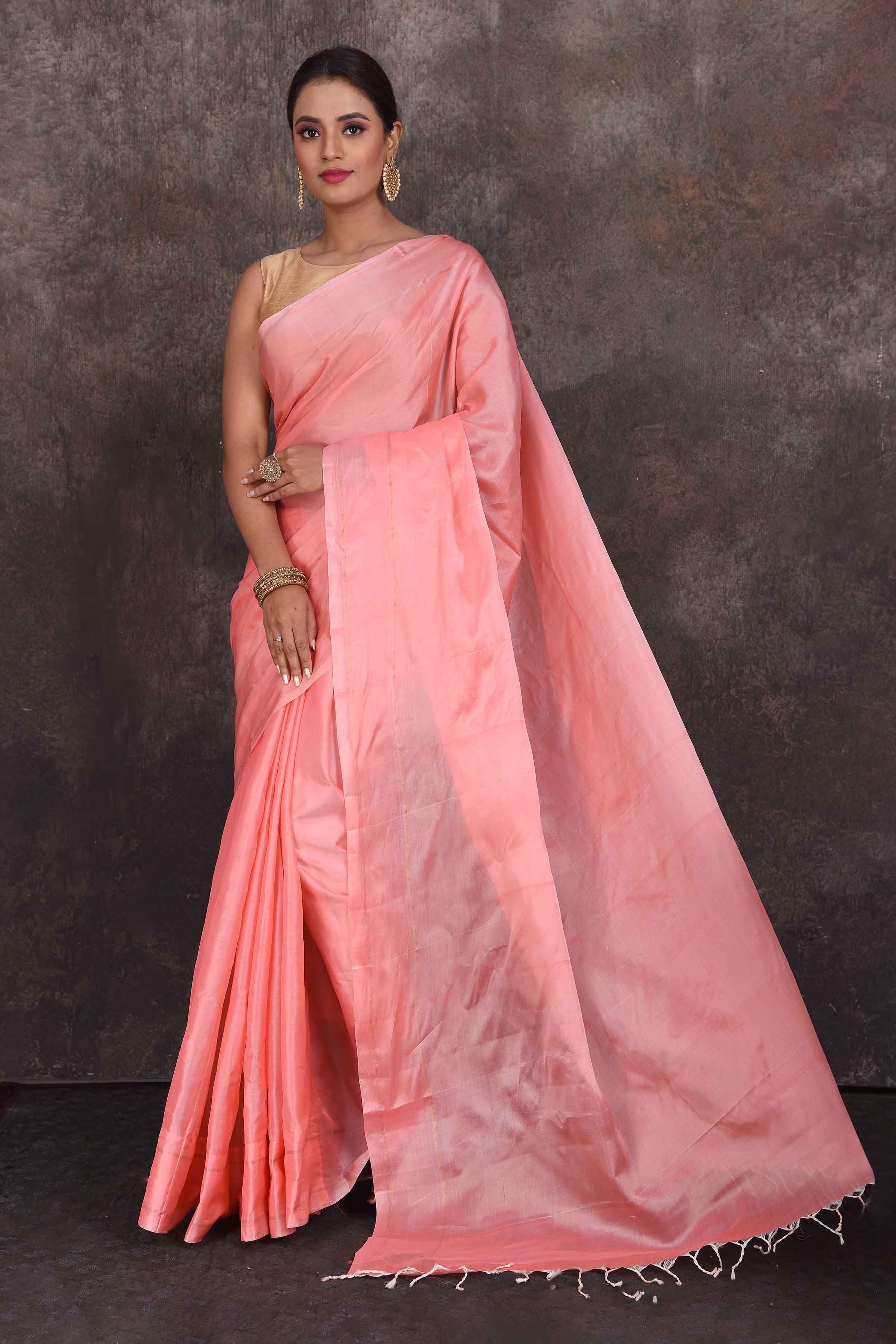 Shop stunning solid baby pink Kanchipuram silk sari online in USA. Look your best at parties in elegant silk sarees, designer sarees, handwoven sarees, Kanchipuram silk sarees, embroidered sarees, South silk sarees from Pure Elegance Indian saree store in USA.-full view
