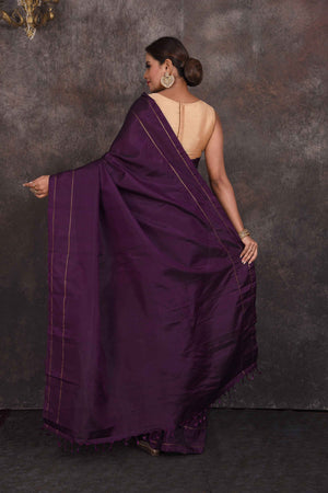 Buy beautiful purple Kanchipuram silk sari online in USA with zari line border. Look your best at parties in elegant silk sarees, designer sarees, handwoven sarees, Kanchipuram silk sarees, embroidered sarees, South silk sarees from Pure Elegance Indian saree store in USA.-back