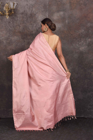 Shop stunning solid dusty pink Kanchipuram silk sari online in USA. Look your best at parties in elegant silk sarees, designer sarees, handwoven sarees, Kanchipuram silk sarees, embroidered sarees, South silk sarees from Pure Elegance Indian saree store in USA.-back