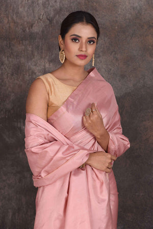 Shop stunning solid dusty pink Kanchipuram silk sari online in USA. Look your best at parties in elegant silk sarees, designer sarees, handwoven sarees, Kanchipuram silk sarees, embroidered sarees, South silk sarees from Pure Elegance Indian saree store in USA.-closeup