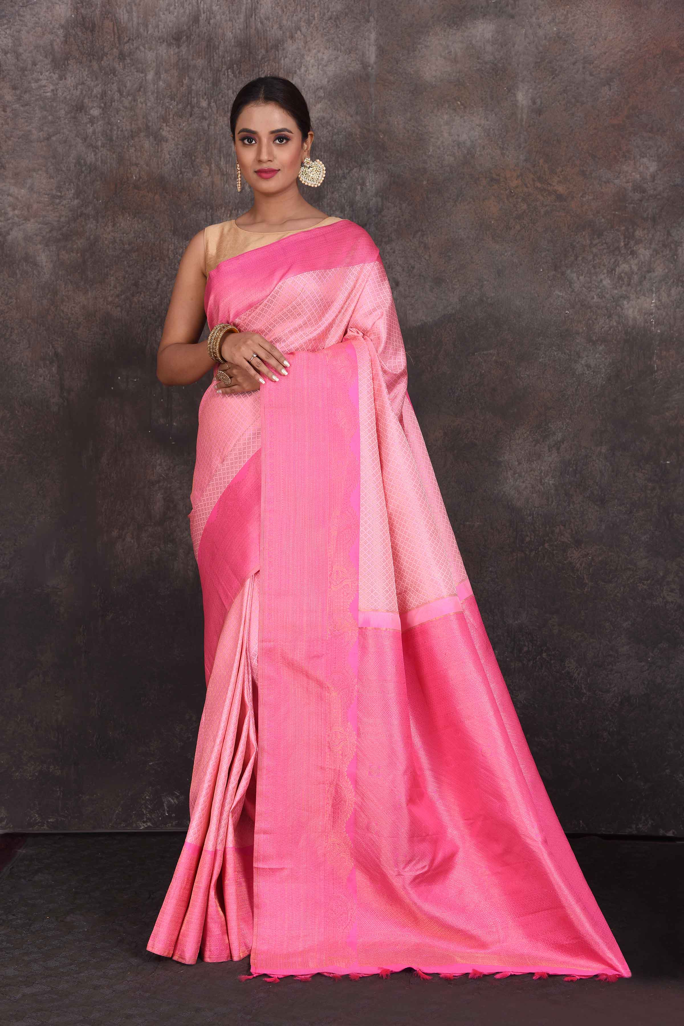 Buy beautiful light pink Kanjivaram silk saree online in USA with dark pink border. Look your best at parties in elegant silk sarees, designer sarees, handwoven sarees, Kanchipuram silk sarees, embroidered sarees, South silk sarees from Pure Elegance Indian saree store in USA.-full view