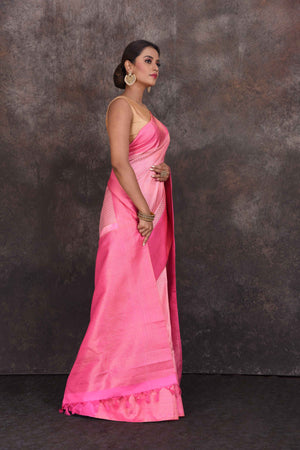 Buy beautiful light pink Kanjivaram silk saree online in USA with dark pink border. Look your best at parties in elegant silk sarees, designer sarees, handwoven sarees, Kanchipuram silk sarees, embroidered sarees, South silk sarees from Pure Elegance Indian saree store in USA.-side