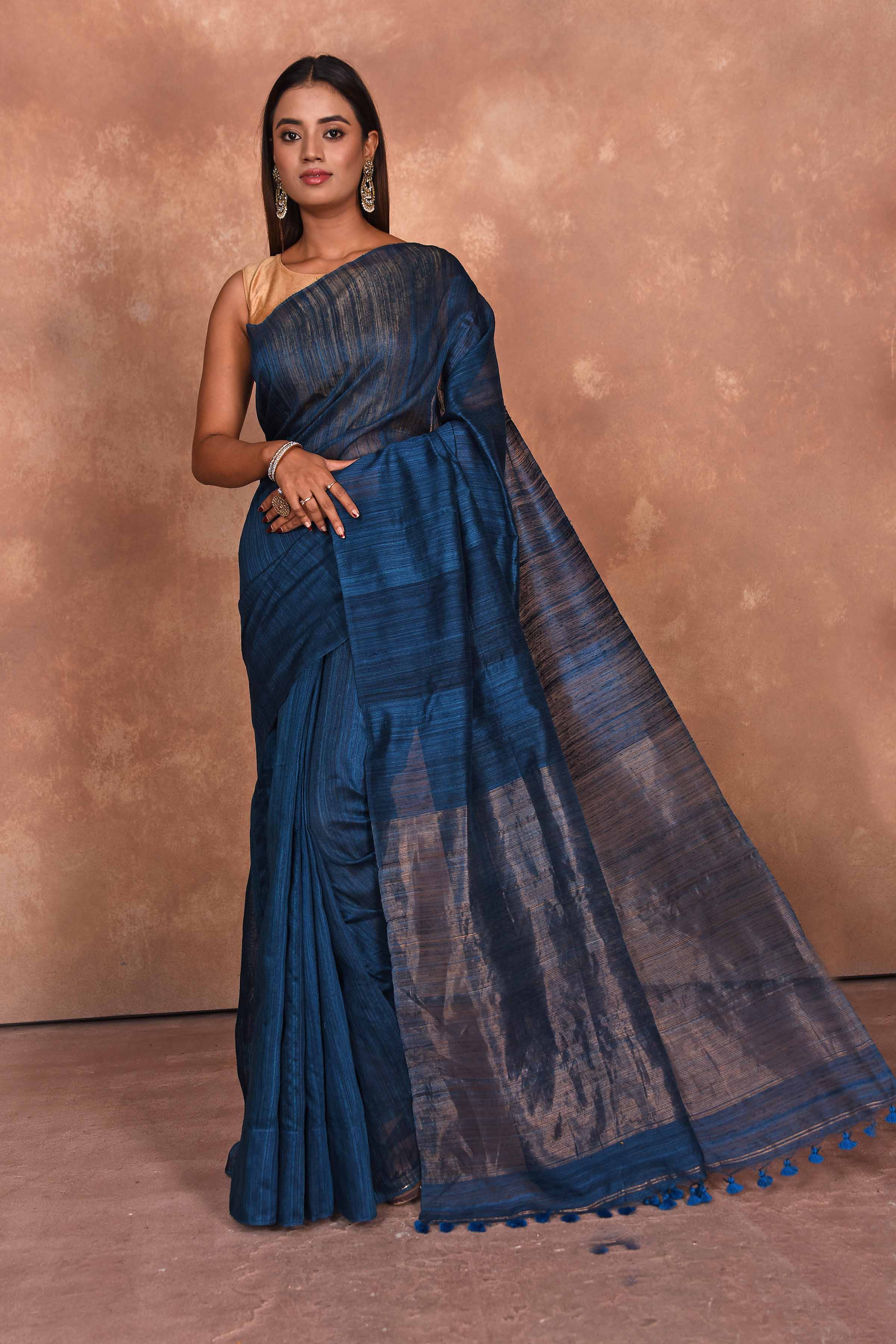 Buy dark blue matka silk sari online in USA with light zari pallu. Keep your ethnic wardrobe up to date with latest designer sarees, pure silk saris, Kanchipuram silk sarees, handwoven sarees, tussar silk saris, embroidered sarees, soft silk sarees from Pure Elegance Indian saree store in USA.-full view