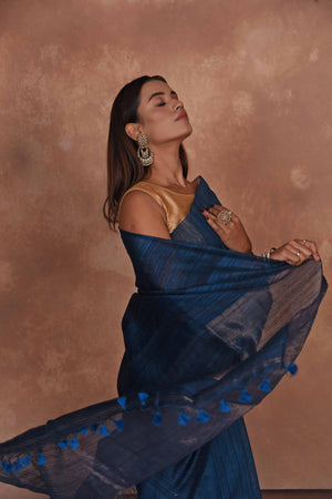 Buy dark blue matka silk sari online in USA with light zari pallu. Keep your ethnic wardrobe up to date with latest designer sarees, pure silk saris, Kanchipuram silk sarees, handwoven sarees, tussar silk saris, embroidered sarees, soft silk sarees from Pure Elegance Indian saree store in USA.-closeup