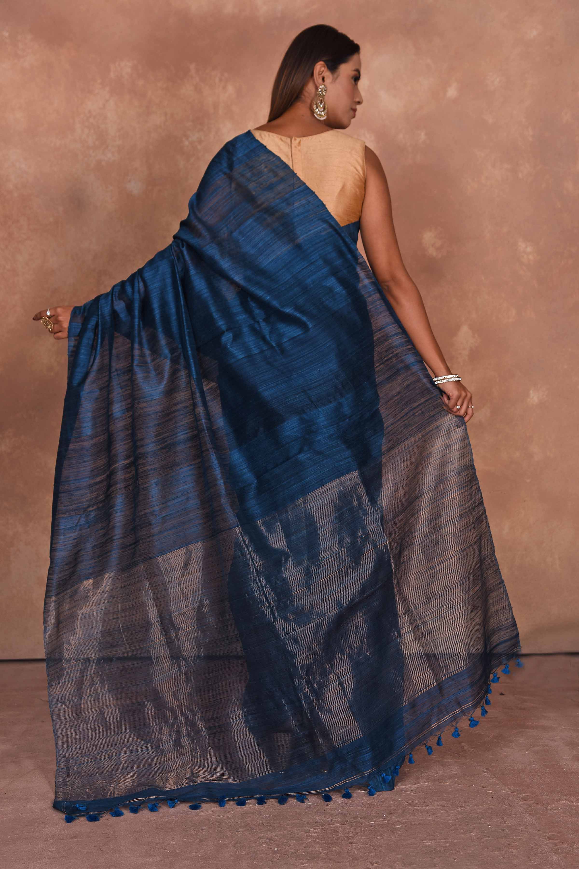 Buy dark blue matka silk sari online in USA with light zari pallu. Keep your ethnic wardrobe up to date with latest designer sarees, pure silk saris, Kanchipuram silk sarees, handwoven sarees, tussar silk saris, embroidered sarees, soft silk sarees from Pure Elegance Indian saree store in USA.-back