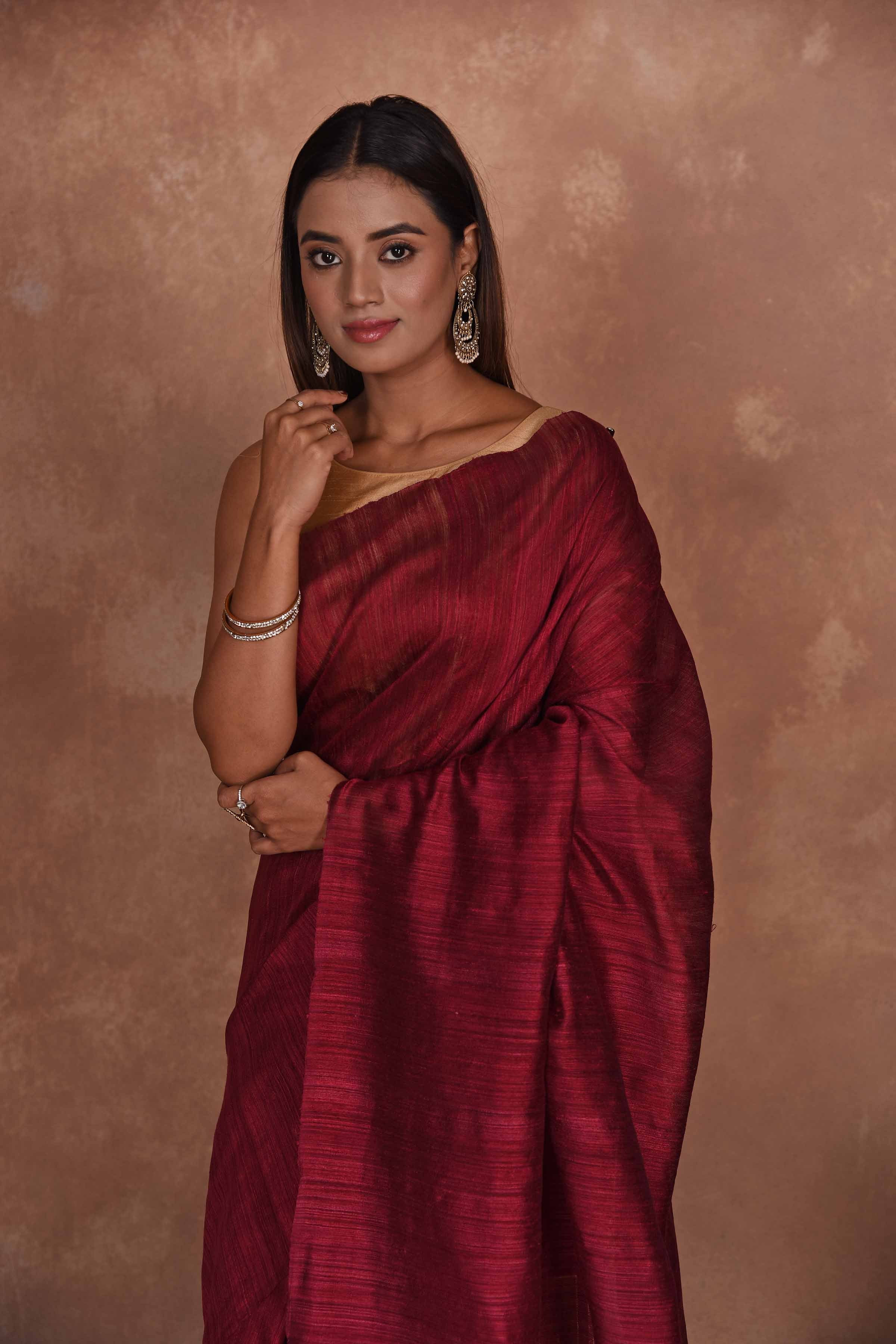 Buy beautiful blood red matka silk sari online in USA with light zari pallu. Keep your ethnic wardrobe up to date with latest designer sarees, pure silk saris, Kanchipuram silk sarees, handwoven sarees, tussar silk saris, embroidered sarees, soft silk sarees from Pure Elegance Indian saree store in USA.-closeup