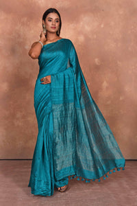 Shop sea blue matka silk sari online in USA with light zari pallu. Keep your ethnic wardrobe up to date with latest designer sarees, pure silk saris, Kanchipuram silk sarees, handwoven sarees, tussar silk saris, embroidered sarees, soft silk sarees from Pure Elegance Indian saree store in USA.-full view