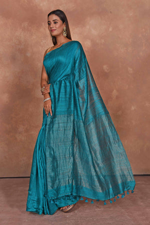 Shop sea blue matka silk sari online in USA with light zari pallu. Keep your ethnic wardrobe up to date with latest designer sarees, pure silk saris, Kanchipuram silk sarees, handwoven sarees, tussar silk saris, embroidered sarees, soft silk sarees from Pure Elegance Indian saree store in USA.-pallu