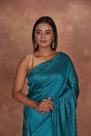Shop sea blue matka silk sari online in USA with light zari pallu. Keep your ethnic wardrobe up to date with latest designer sarees, pure silk saris, Kanchipuram silk sarees, handwoven sarees, tussar silk saris, embroidered sarees, soft silk sarees from Pure Elegance Indian saree store in USA.-closeup