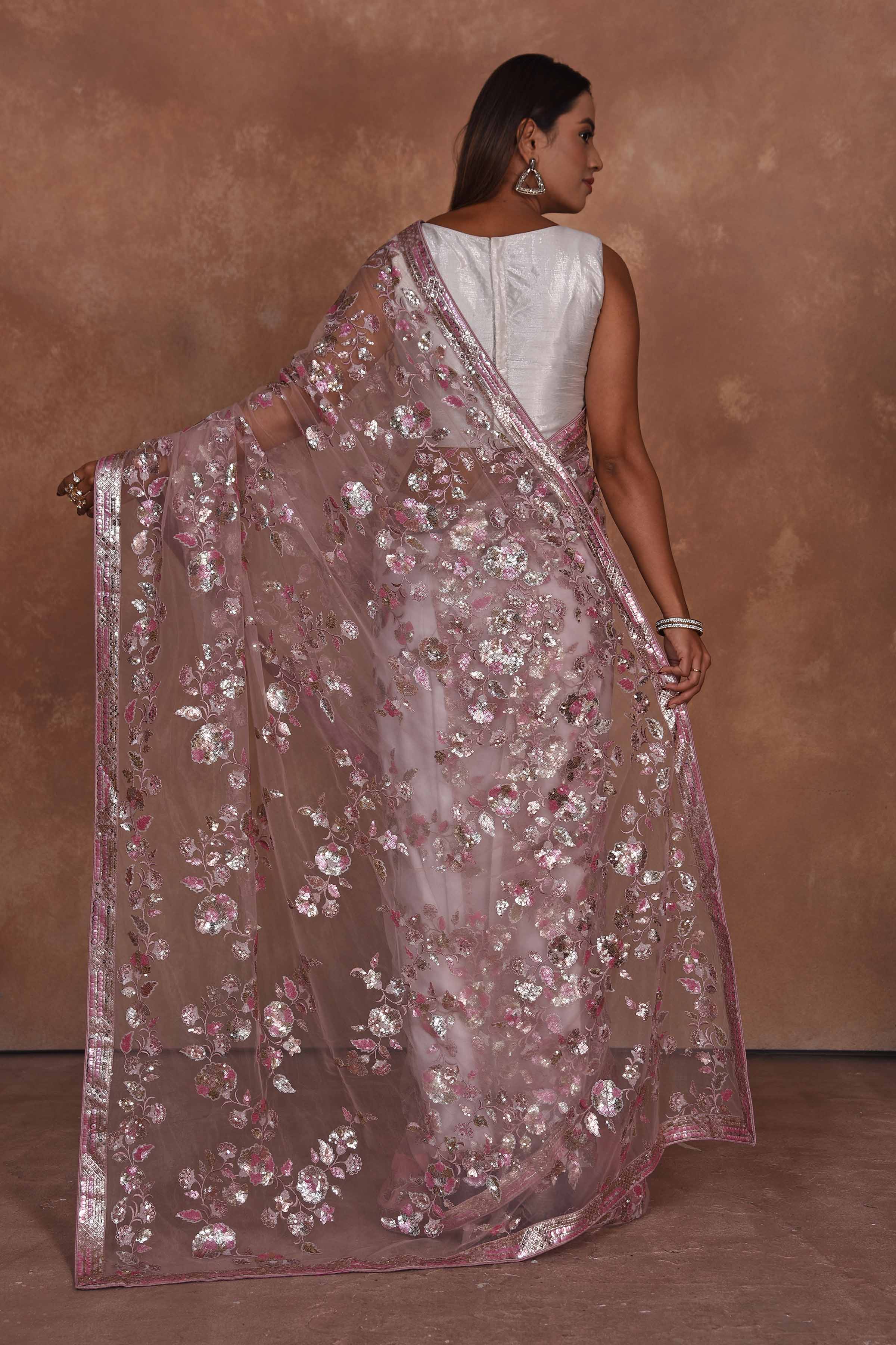 Buy dusty pink heavy embroidery net saree online in USA. Keep your ethnic wardrobe up to date with latest designer sarees, pure silk saris, Kanchipuram silk sarees, handwoven sarees, tussar silk saris, embroidered sarees, soft silk sarees from Pure Elegance Indian saree store in USA.-back