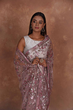 Buy dusty pink heavy embroidery net saree online in USA. Keep your ethnic wardrobe up to date with latest designer sarees, pure silk saris, Kanchipuram silk sarees, handwoven sarees, tussar silk saris, embroidered sarees, soft silk sarees from Pure Elegance Indian saree store in USA.-closeup