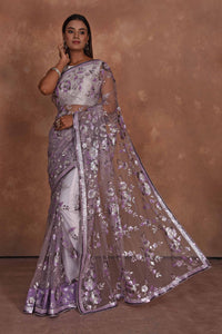 Shop lavender heavy embroidery net saree online in USA. Keep your ethnic wardrobe up to date with latest designer sarees, pure silk saris, Kanchipuram silk sarees, handwoven sarees, tussar silk saris, embroidered sarees, soft silk sarees from Pure Elegance Indian saree store in USA.-full view