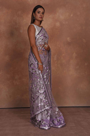 Shop lavender heavy embroidery net saree online in USA. Keep your ethnic wardrobe up to date with latest designer sarees, pure silk saris, Kanchipuram silk sarees, handwoven sarees, tussar silk saris, embroidered sarees, soft silk sarees from Pure Elegance Indian saree store in USA.-side