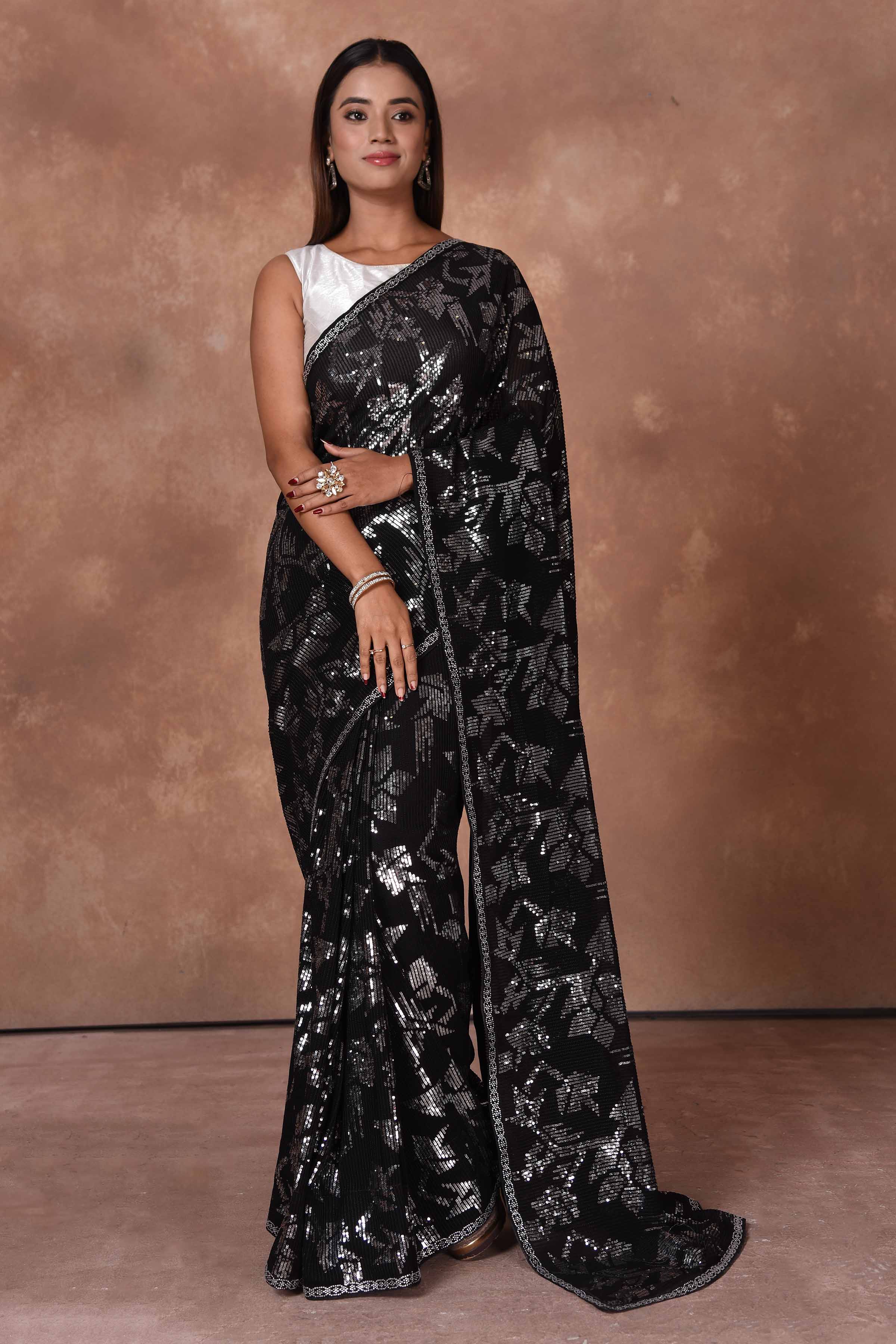 Shop stunning black and silver sequin work saree online in USA. Keep your ethnic wardrobe up to date with latest designer sarees, pure silk saris, Kanchipuram silk sarees, handwoven sarees, tussar silk saris, embroidered sarees, soft silk sarees from Pure Elegance Indian saree store in USA.-full view
