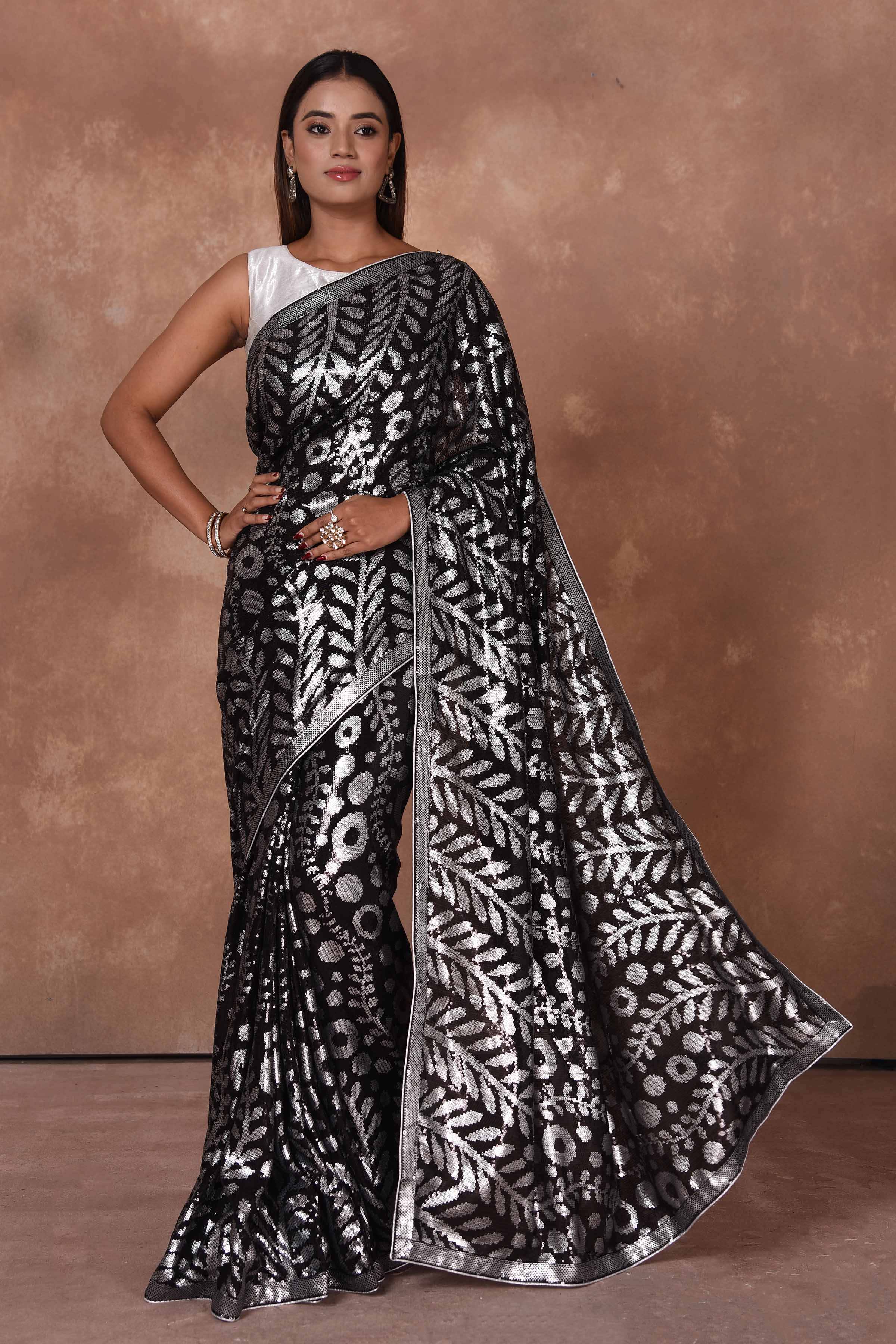 Shop stunning black and silver sequin saree online in USA. Keep your ethnic wardrobe up to date with latest designer sarees, pure silk saris, Kanchipuram silk sarees, handwoven sarees, tussar silk saris, embroidered sarees, soft silk sarees from Pure Elegance Indian saree store in USA.-full view