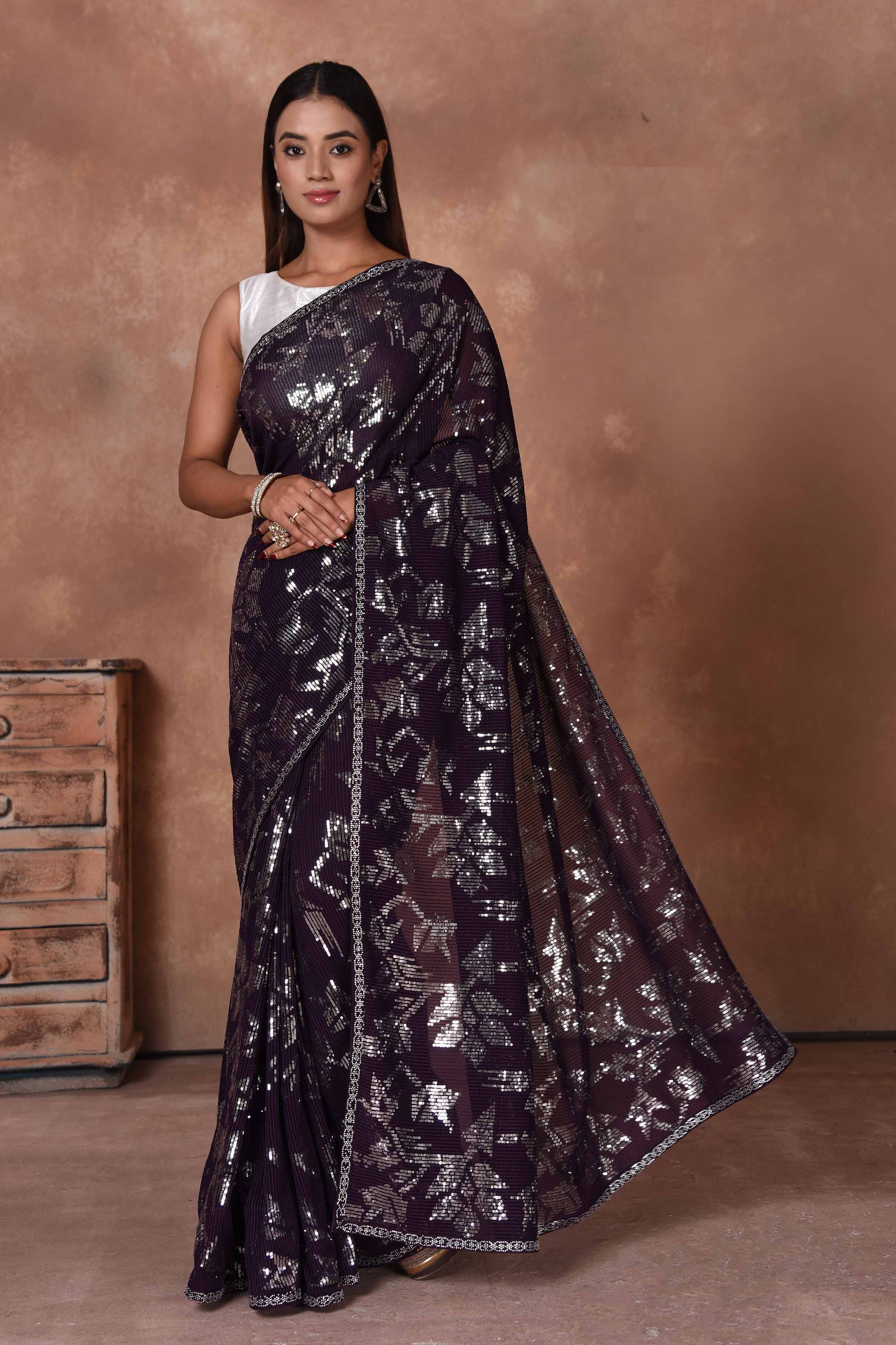 Buy purple and silver sequin saree online in USA. Keep your ethnic wardrobe up to date with latest designer sarees, pure silk saris, Kanchipuram silk sarees, handwoven sarees, tussar silk saris, embroidered sarees, soft silk sarees from Pure Elegance Indian saree store in USA.-full view