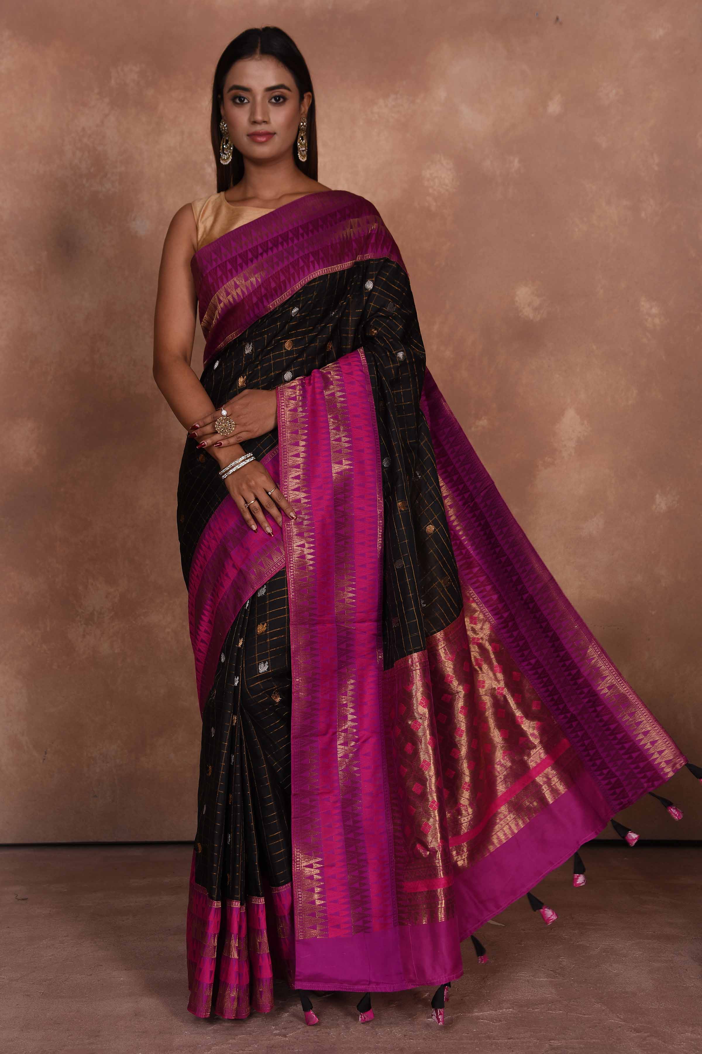 Buy beautiful black fancy Gadhwal sari online in USA with pink zari border. Keep your ethnic wardrobe up to date with latest designer sarees, pure silk saris, Kanchipuram silk sarees, handwoven sarees, tussar silk saris, embroidered sarees, soft silk sarees, Kora silk sarees from Pure Elegance Indian saree store in USA.-full view