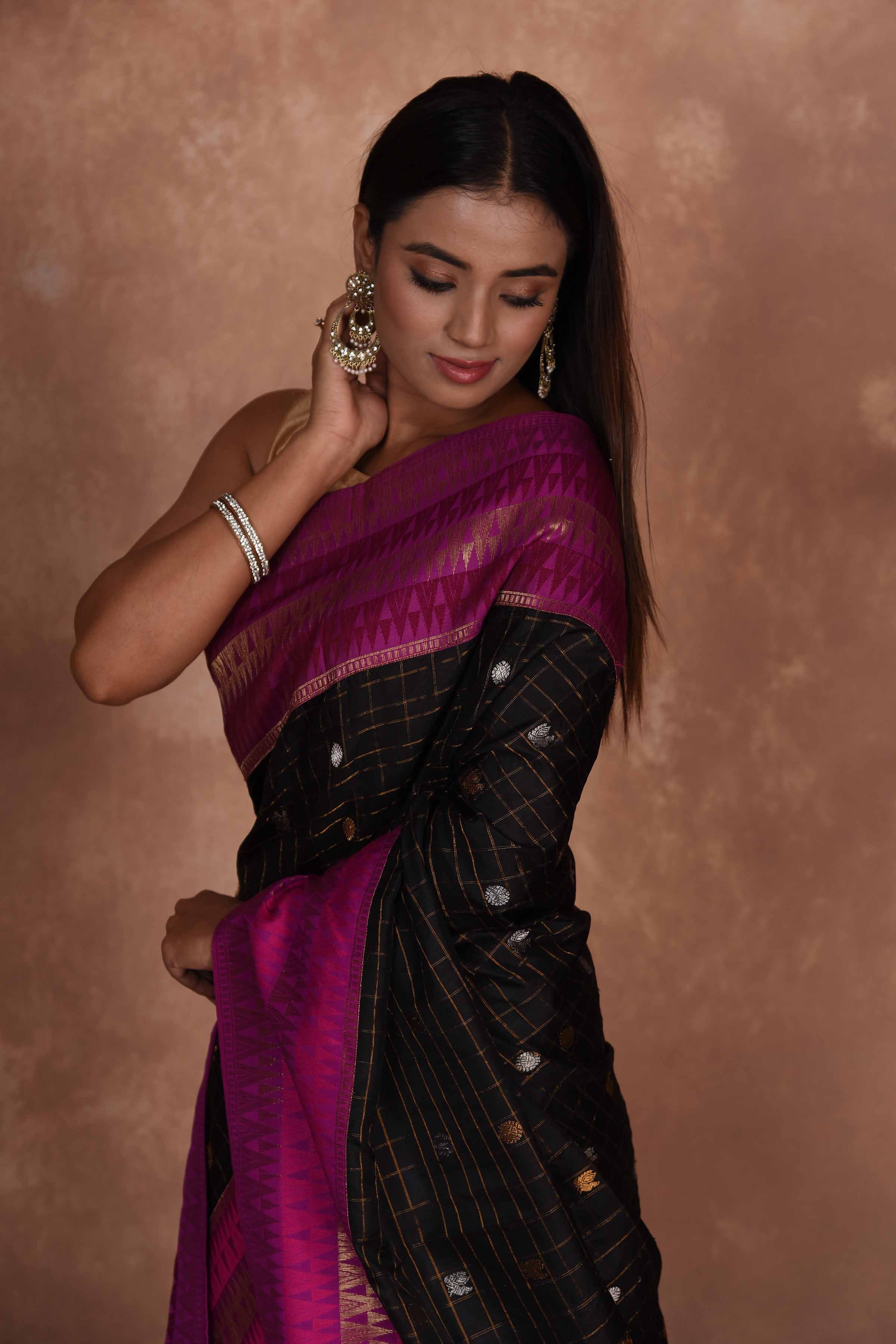 Buy beautiful black fancy Gadhwal sari online in USA with pink zari border. Keep your ethnic wardrobe up to date with latest designer sarees, pure silk saris, Kanchipuram silk sarees, handwoven sarees, tussar silk saris, embroidered sarees, soft silk sarees, Kora silk sarees from Pure Elegance Indian saree store in USA.-closeup