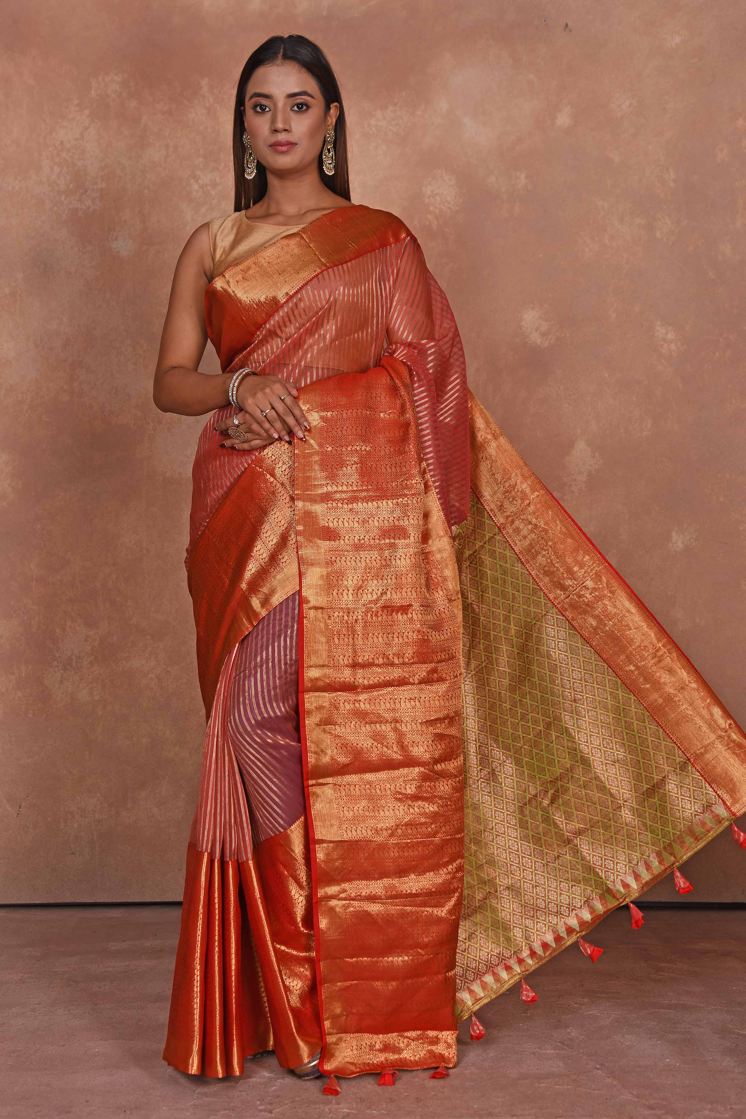Buy red Kanjeevaram Kora sari online in USA with green zari pallu. Keep your ethnic wardrobe up to date with latest designer sarees, pure silk saris, Kanchipuram silk sarees, handwoven sarees, tussar silk saris, embroidered sarees, soft silk sarees, Kora silk sarees from Pure Elegance Indian saree store in USA.-full view