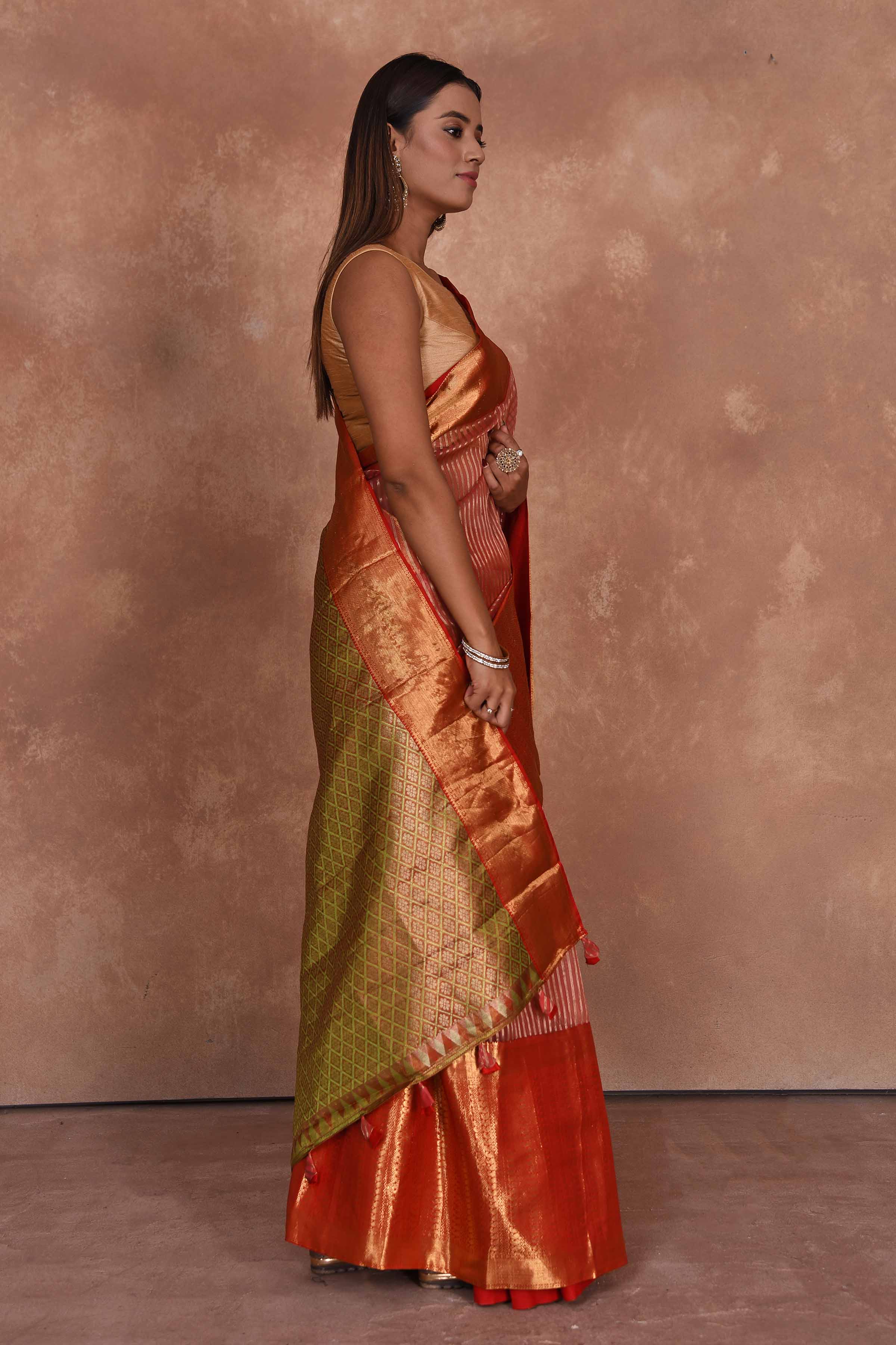 Buy red Kanjeevaram Kora sari online in USA with green zari pallu. Keep your ethnic wardrobe up to date with latest designer sarees, pure silk saris, Kanchipuram silk sarees, handwoven sarees, tussar silk saris, embroidered sarees, soft silk sarees, Kora silk sarees from Pure Elegance Indian saree store in USA.-side