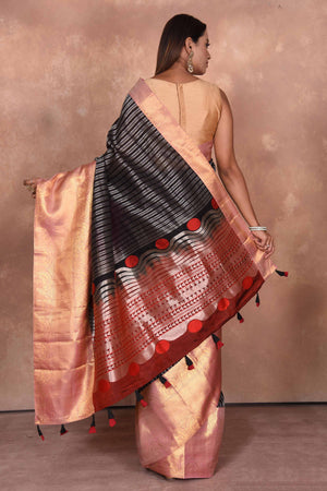 Buy black striped Kanjeevaram Kora sari online in USA with red zari border. Keep your ethnic wardrobe up to date with latest designer sarees, pure silk saris, Kanchipuram silk sarees, handwoven sarees, tussar silk saris, embroidered sarees, soft silk sarees, Kora silk sarees from Pure Elegance Indian saree store in USA.-back