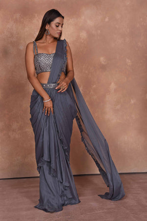 Buy grey designer georgette saree online in USA with embroidered blouse. Dazzle on weddings and special occasions with exquisite Indian designer dresses, embroidered sarees, partywear sarees, Bollywood sarees, handloom sarees from Pure Elegance Indian clothing store in USA.-front