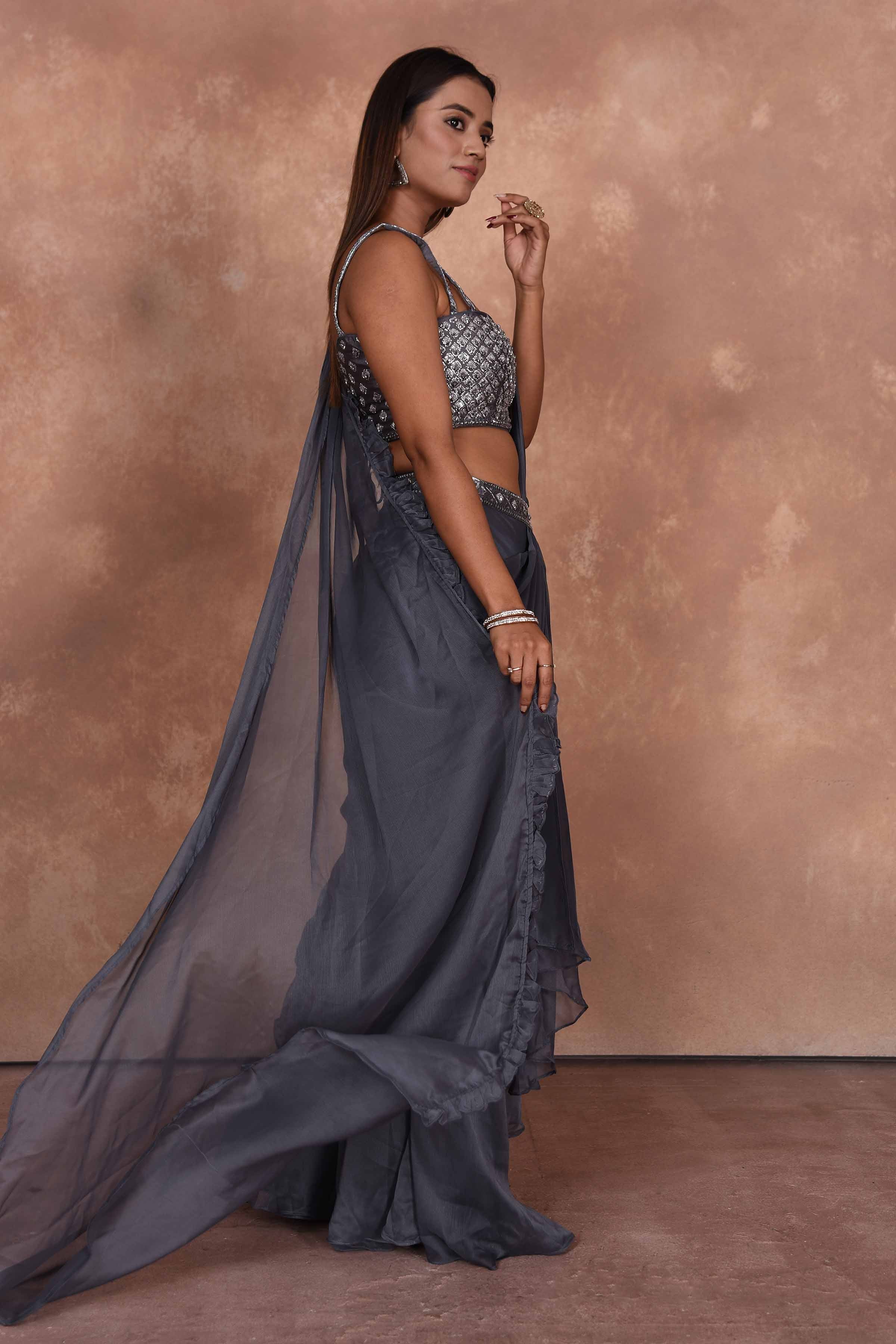 Buy grey designer georgette saree online in USA with embroidered blouse. Dazzle on weddings and special occasions with exquisite Indian designer dresses, embroidered sarees, partywear sarees, Bollywood sarees, handloom sarees from Pure Elegance Indian clothing store in USA.-side