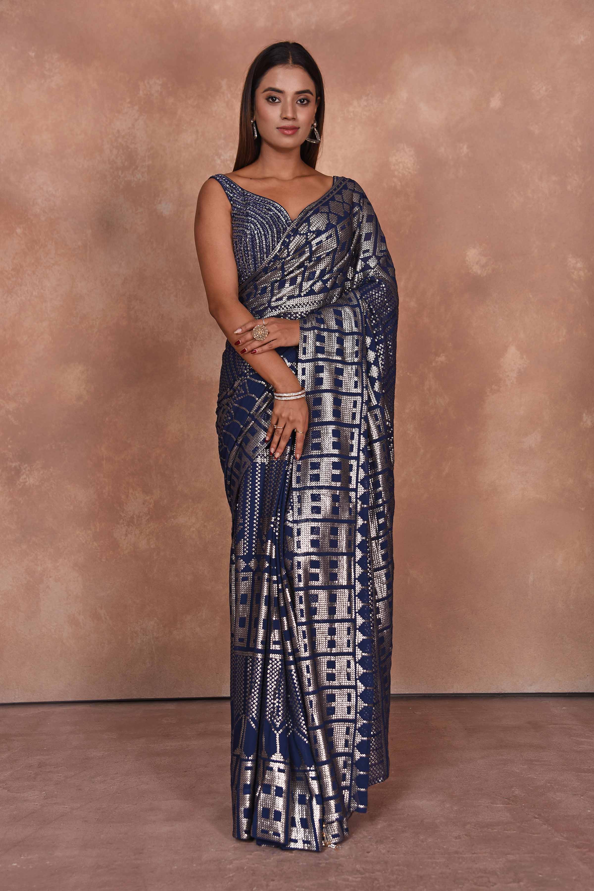 Buy blue sequin work georgette saree online in USA with embroidered blouse. Dazzle on weddings and special occasions with exquisite Indian designer dresses, embroidered sarees, partywear sarees, Bollywood sarees, handloom sarees from Pure Elegance Indian clothing store in USA.-full view