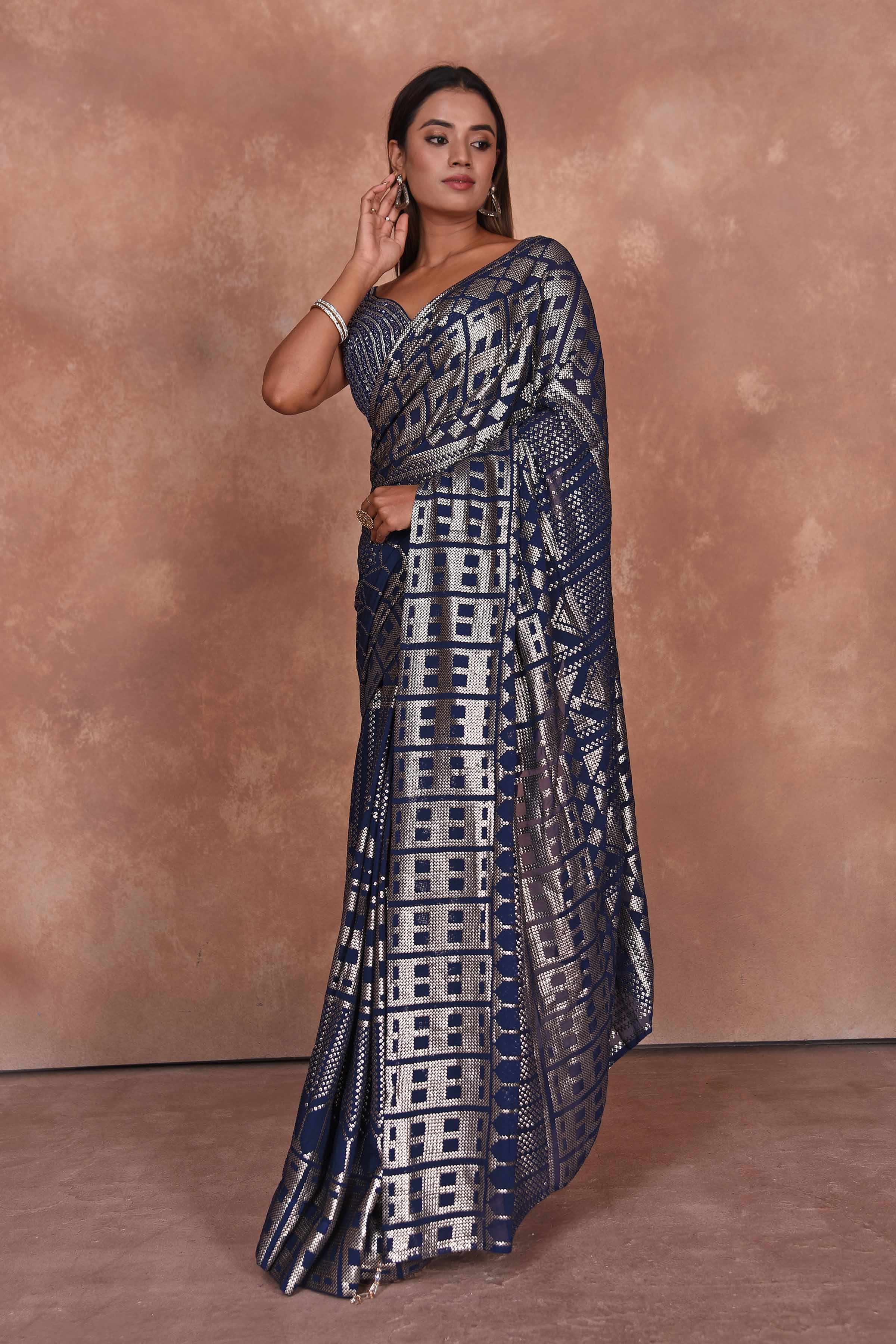 Buy blue sequin work georgette saree online in USA with embroidered blouse. Dazzle on weddings and special occasions with exquisite Indian designer dresses, embroidered sarees, partywear sarees, Bollywood sarees, handloom sarees from Pure Elegance Indian clothing store in USA.-side