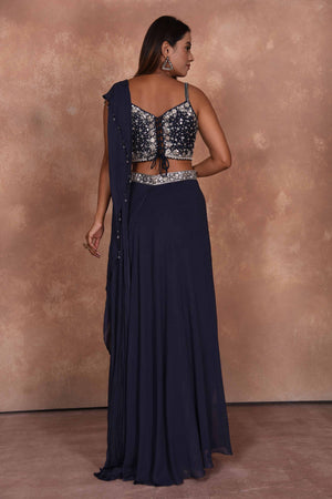 Buy dark blue designer lehenga saree online in USA with embroidered blouse. Dazzle on weddings and special occasions with exquisite Indian designer dresses, embroidered sarees, partywear sarees, Bollywood sarees, handloom sarees from Pure Elegance Indian clothing store in USA.-back