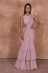 Shop powder pink ruffle saree online in USA with embroidered designer blouse. Dazzle on weddings and special occasions with exquisite Indian designer dresses, embroidered sarees, partywear sarees, Bollywood sarees, handloom sarees from Pure Elegance Indian clothing store in USA.-full view