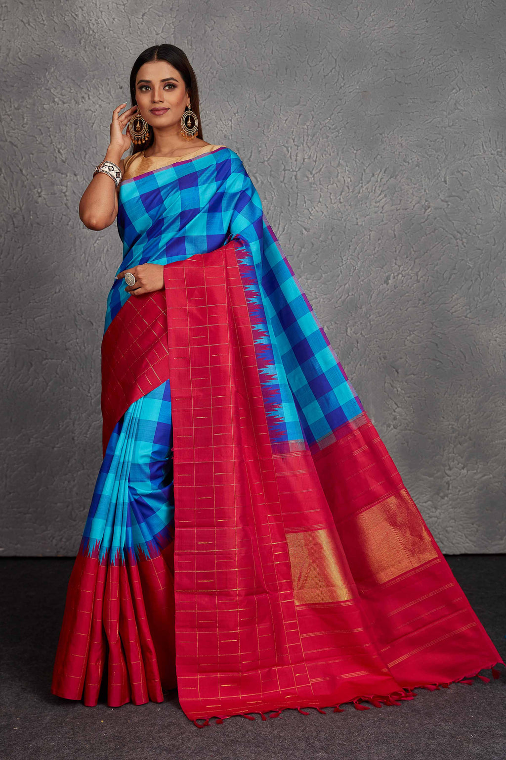 Buy beautiful blue checker Kanjivaram silk sari online in USA with pink border. Get festive ready in beautiful Kanchipuram silk saris, pure silk sarees, soft silk sarees, tussar silk saris, handwoven sarees, chanderi silk sarees from Pure Elegance Indian fashion store in USA.-full view