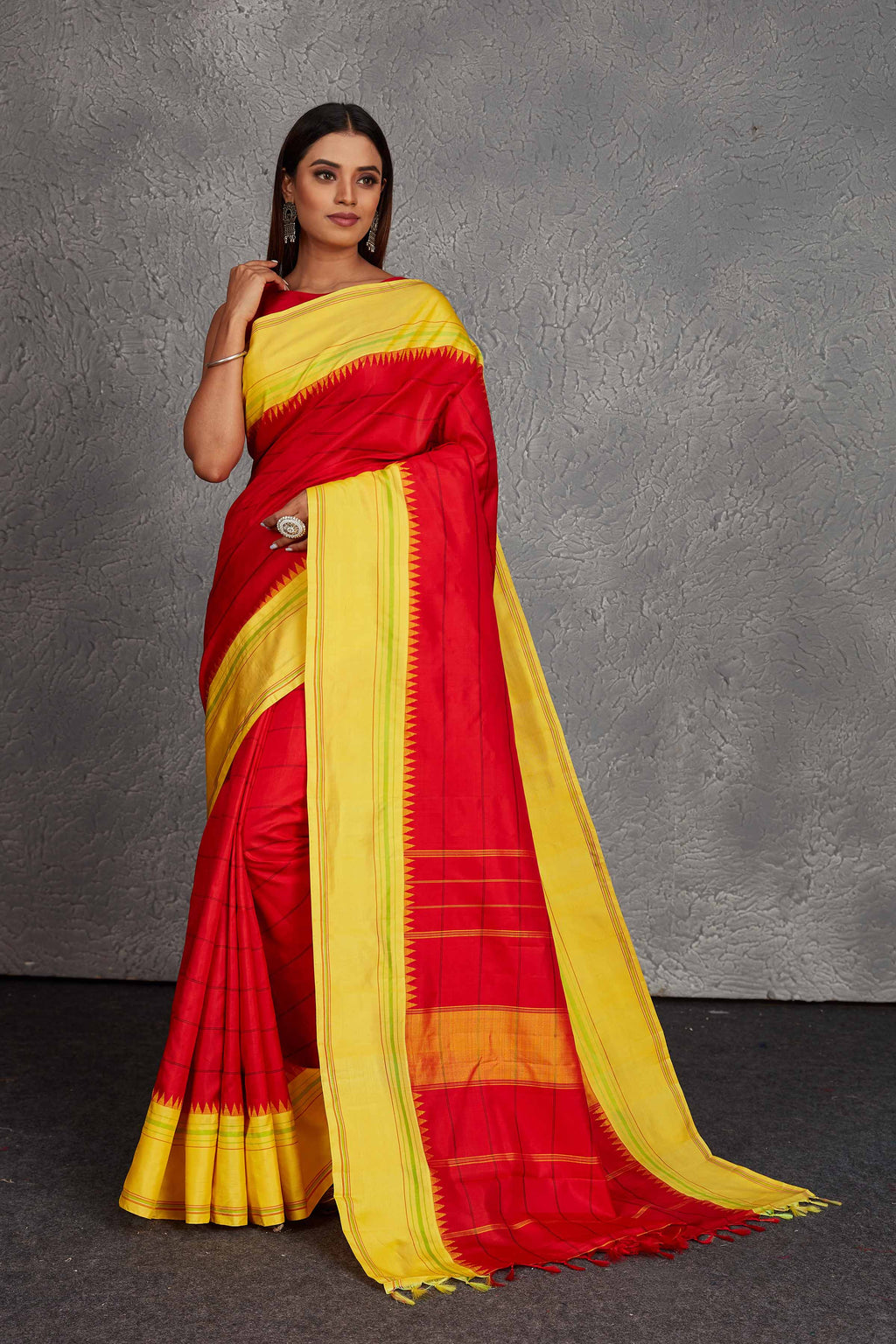 Shop beautiful red Kanjivaram silk saree online in USA with yellow border. Get festive ready in beautiful Kanchipuram silk saris, pure silk sarees, soft silk sarees, tussar silk saris, handwoven sarees, chanderi silk sarees from Pure Elegance Indian fashion store in USA.-full view