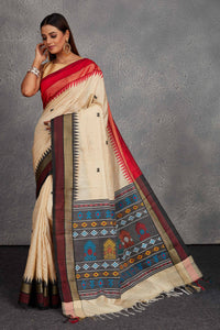 Buy beautiful cream tussar silk saree online in USA with multicolor weave pallu. Get festive ready in beautiful Kanchipuram silk saris, pure silk sarees, soft silk sarees, tussar silk saris, handwoven sarees, chanderi silk sarees from Pure Elegance Indian fashion store in USA.-full view