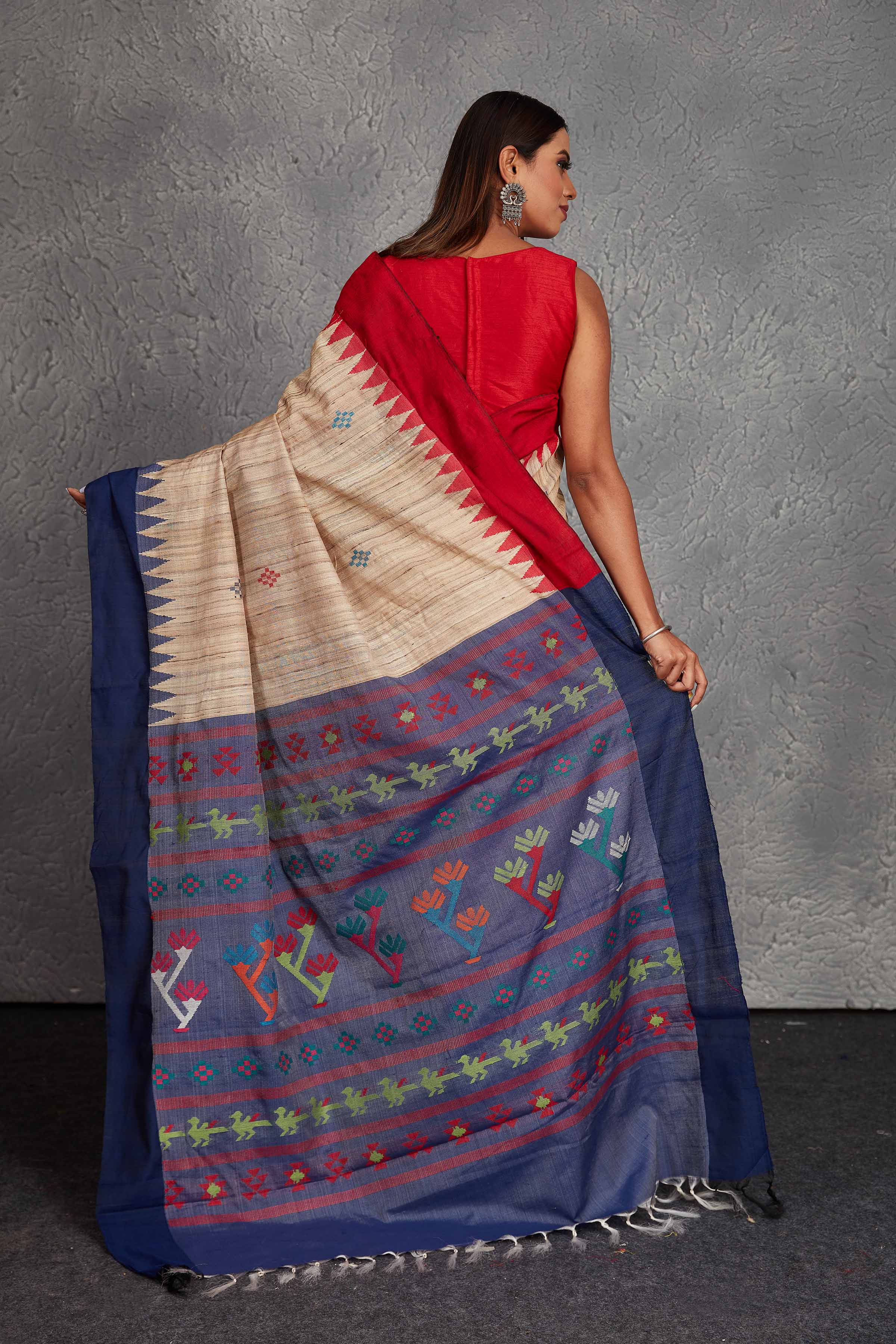 Shop beautiful beige tussar silk sari online in USA with blue weave pallu. Get festive ready in beautiful Kanchipuram silk saris, pure silk sarees, soft silk sarees, tussar silk saris, handwoven sarees, chanderi silk sarees from Pure Elegance Indian fashion store in USA.-back