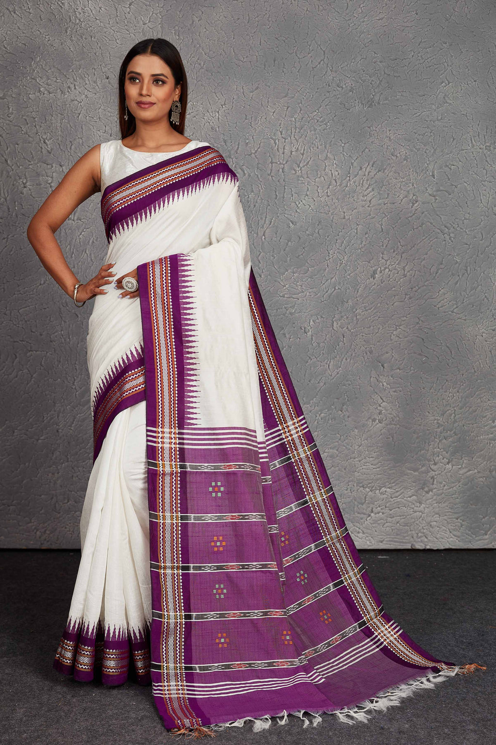 Shop white tussar silk sari online in USA with purple border and pallu. Get festive ready in beautiful Kanchipuram silk saris, pure silk sarees, soft silk sarees, tussar silk saris, handwoven sarees, chanderi silk sarees from Pure Elegance Indian fashion store in USA.-full view