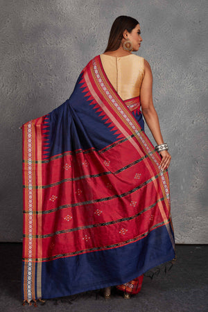 Buy navy blue tussar silk saree online in USA with red temple border and pallu. Get festive ready in beautiful Kanchipuram silk saris, pure silk sarees, soft silk sarees, tussar silk saris, handwoven sarees, chanderi silk sarees from Pure Elegance Indian fashion store in USA.-back